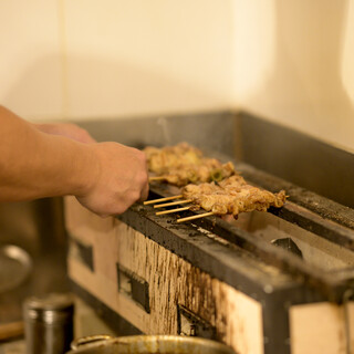 "Enjoying Artisan-Grilled Charcoal Chicken with a Secret Sauce Made from All-Natural Handmade Ingredients"