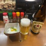 Tori Fuji - 瓶ビールとお通し。キリン・サッポロ・アサヒから選べます。