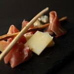 Assortment of Prosciutto and 3 types of cheese
