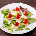 Caprese with cherry tomatoes and cheese