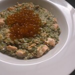Homemade salmon roe, salmon, and green seaweed risotto