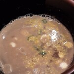 中華蕎麦 とみ田 - 黄色いみかんが振りかけられたスープ割り