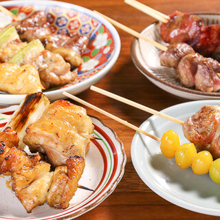 Yakitori (grilled chicken skewers) made with Kyoto red chicken and grilled over Bincho charcoal. Enjoy with Alpine salt