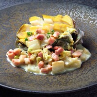 活アワビの蒸し焼き