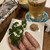 オーディ・ダイナー - 料理写真:ぷりぷりソーセージ600円とグラスビール600円グラスでかいよね。あ、ちょっと飲んじゃってます。