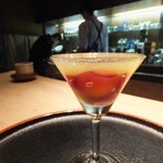 梶川 - デザート；メロンソースにカモミールのジュレと枇杷のコンポート