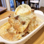 Carbonara lasagna topped with soft-boiled eggs from Itoshima