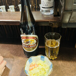 おかめ - キリンラガービールと付きだしのポテサラ♪