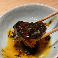 TANAKA YAKINIKU RESTAURANTE - サーロインに卵黄とトリュフを絡ませていただきます