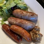 Assortment of Iberico pork salsiccia and coarsely ground chorizo - served with Otaki arugula salad -