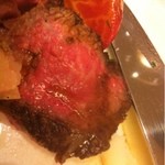 Drammatico - 鹿児島牛のタリアータ仕立て　ルッコラとパルミジャーノ添え
      