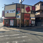 Genkotsu - 駐車場側から　左側が国道2号線