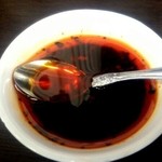 担々麺 杉山 - トッピングの大辛ラー油。