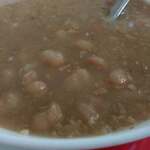 191734818 - 白いんげん豆のとろみとベーコンの濃厚なスープ(フェイジョン)。あまりにも美味しくて3杯も食べてしまいました。