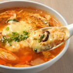 Delicious and spicy cheese ribs soup