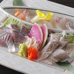 Assortment of three types of sashimi of the day