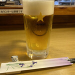 Izakaya Totoro - 生ビール。箸置きがかわいい
