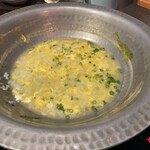 博多華味鳥 天神西通り店 - サービス係が雑炊を作ってくれました。