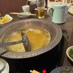 博多華味鳥 天神西通り店 - 雑炊製作中