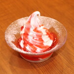 Rich strawberry sauce soft serve