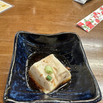 Sankyuuchuubou - お通しは湯豆腐にポン酢がかかったのでした