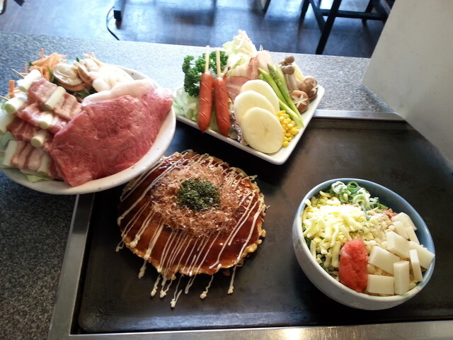 Okonomiyaki No Ueru Kamu