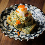 Raw seaweed and Yamari whitebait rolled egg served with tsukudani