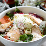 Caesar salad with soft-boiled egg and roast chicken