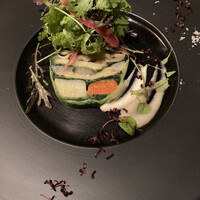 かみくら - 冬野菜のテリーヌ
                    やさしい里芋のピューレと豆乳のソースをつけて頂く美味しい冬野菜