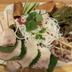 Plate of rice noodles, pork and fried spring rolls (BUN DAU MAM TOM)