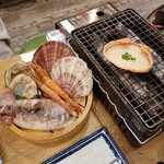 磯丸水産 - カニ味噌甲羅焼き