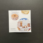 SNOWS - 焼き重ねたバーム生地に、マカロン生地をかけて仕上げる"二度焼き"で異なる食感を演出