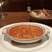 フィーコディンディア - トリッパ。
                    煮込んだだけじゃなく、オーブンでも焼いているのです！
                    チーズでコク増しで、定番かつ間違いのない美味しさ。