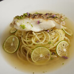 Sea bream peperoncino with vinegar and citrus flavor served with soup pasta