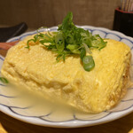 Tsuriyado Sakaba Madume - 貝の出汁に入っているだし巻き卵