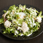Caesar salad with homemade chicken ham and hot spring eggs