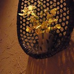 はんなり - 壁に飾られた花