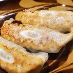 Okinawa Shouten Shimura - アグー豚の餃子（二個食べちゃった後なので、元は五個です）