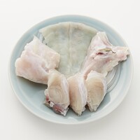 『なべの追加』とらふぐの骨付きあらと身