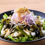 Choregi salad with local chicken and seaweed