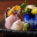 Assortment of three fresh fish sashimi dishes