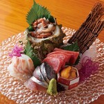 Assortment of five fresh fish sashimi dishes