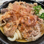 うどん 丸香 - 七味をかけて