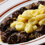 Stewed beef and black pepper peposo and potato gnocchi