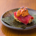 Hand-rolled raw sea urchin and bluefin tuna