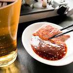 sapporojingisukankicchimbishamon - 当店オリジナルのタレはピリッと辛くジンギスカンにぴったりで、お酒が進みます。