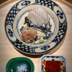 温石 - ボスサイズの平目。切っている様子でモチモチぶりがわかる。プリズムのように光っていた。