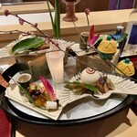銀座 しのはら - 祝い八寸：セリと雉のお浸し、鰤の藁焼き燻し、なまこの茶ぶりの霙酢、干し数の子、玉子真丈、松風、梅人参、のし梅の結び型、黒豆、せんまい漬け、蛸の炊いたん、スモークサーモンの黄身酢がけ、鰆の西京焼き、叩き牛蒡