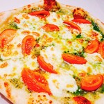 Genoa pizza with lots of tomatoes