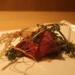 RISTORANTE IL NODO - オリーブ牛ランプの藁焼き